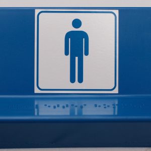 Signalétique braille toilettes homme